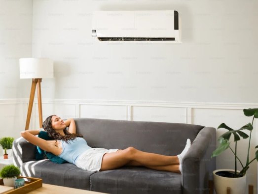 Woman relaxing with air conditioning 