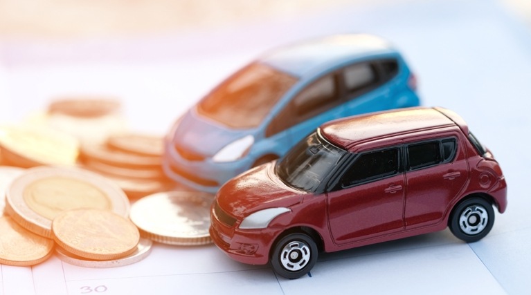 electric car tax model cars and coins