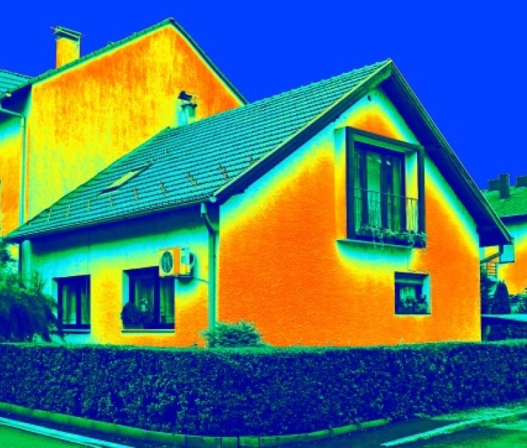 partially insulated house showing heat loss